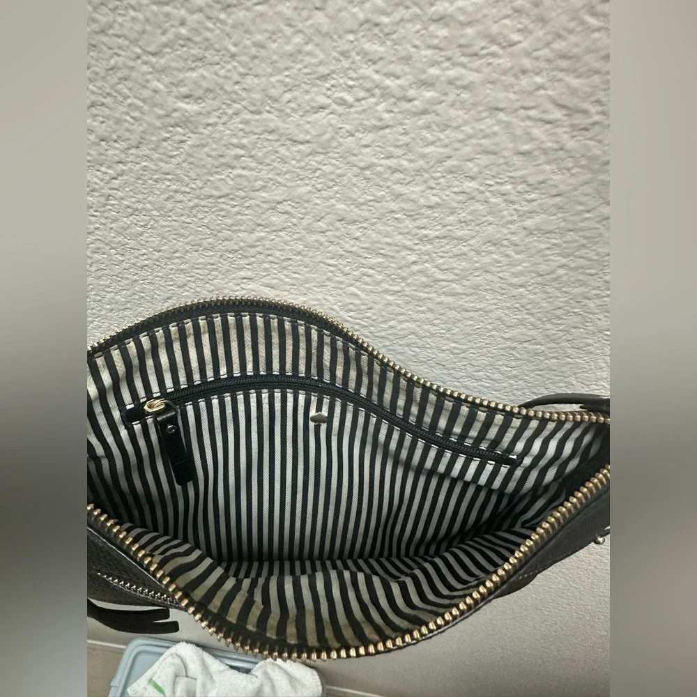 Kate Spade Black Crossbody Bag with Adjustable Strap and Sleek Design